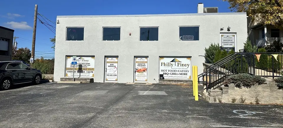 The Philly Pinoy building on Dekalb Pike with Grocery, Hot Food, Catering and Balikbayan Box signs in the windows